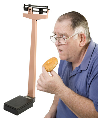 man eating doughnut